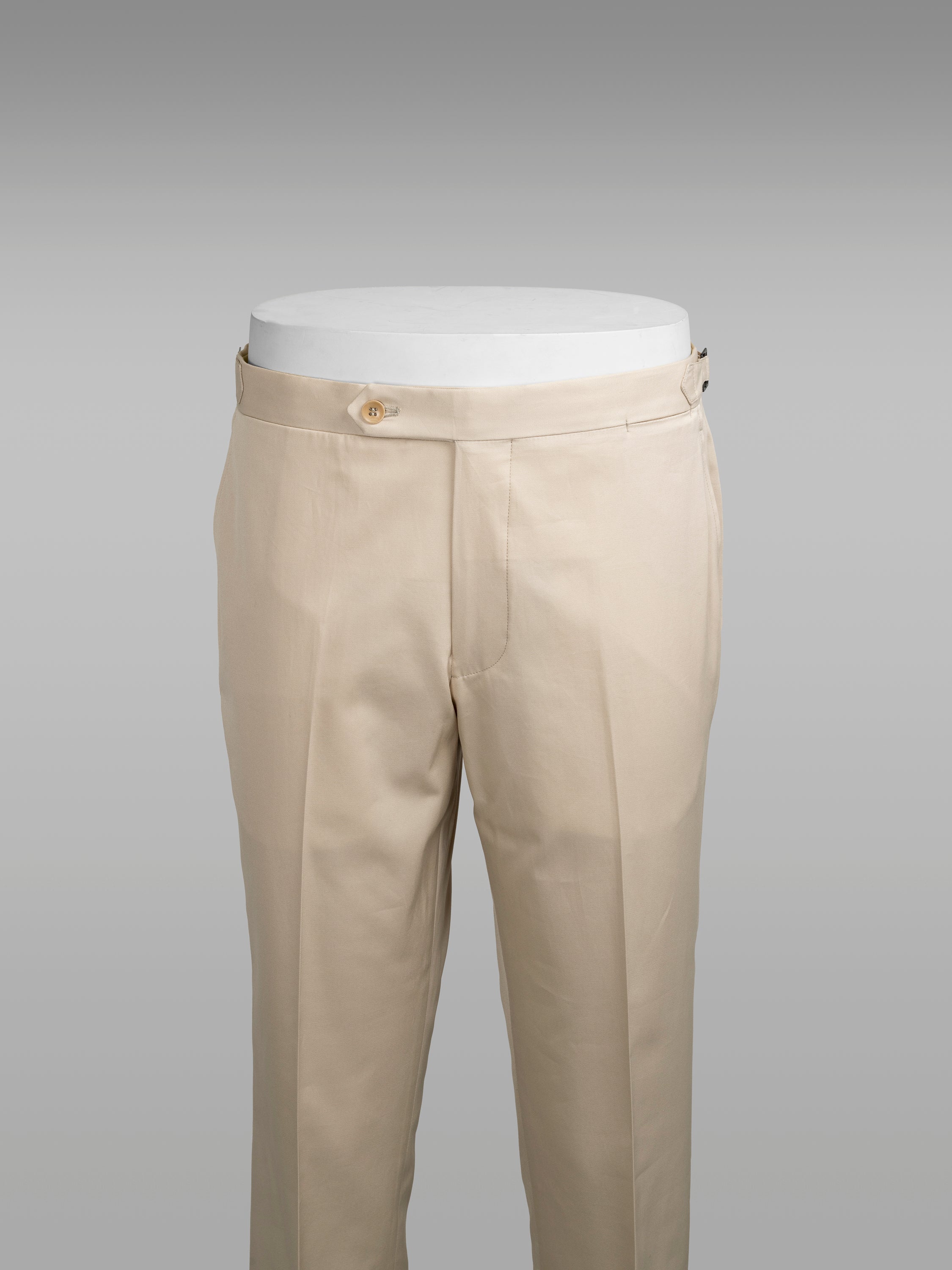 Light beige pair of regular fit supima cotton trousers